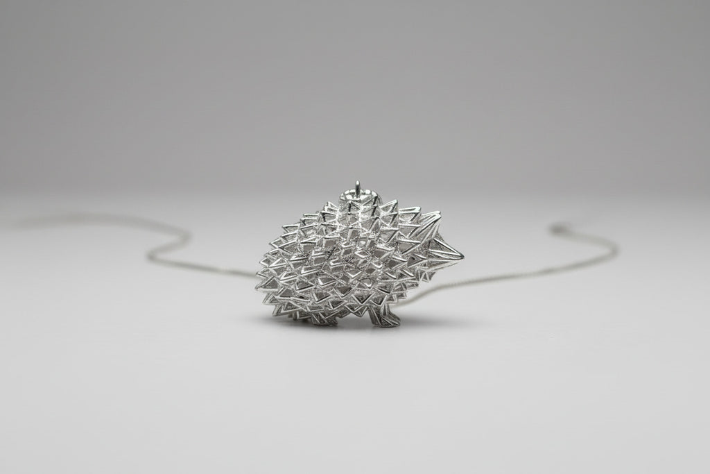 ciondolo riccio monolineare 3D